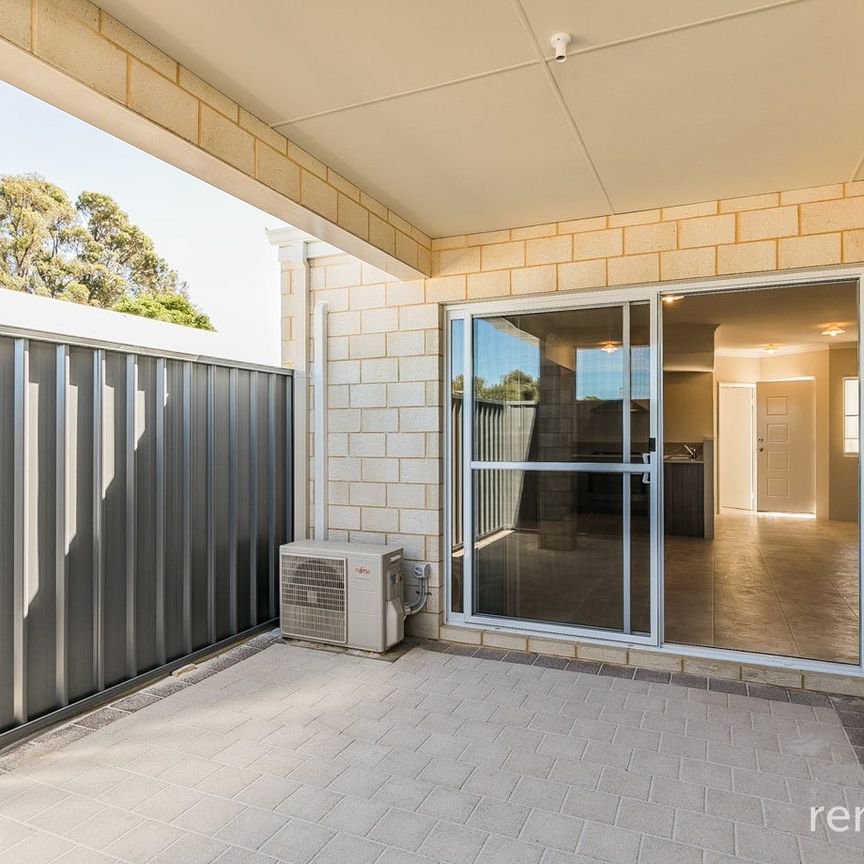MODERN TWO BEDROOM UNIT WITH GARAGE! - Photo 1