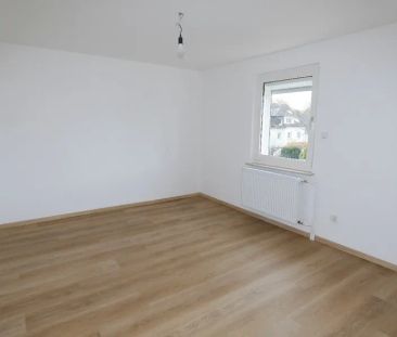 Modernisierte 3-Zimmer-Maisonette-Wohnung im gepflegten Zweifamilie... - Foto 1