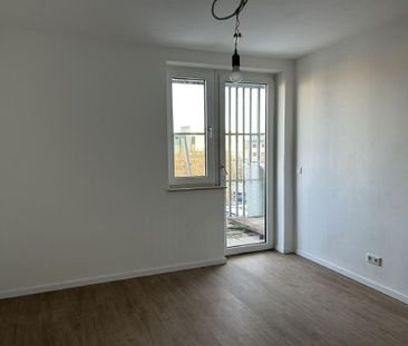 / Mitten im Leben: Stilvolle Stadtwohnung mit Balkon und Stellplatz... - Photo 2