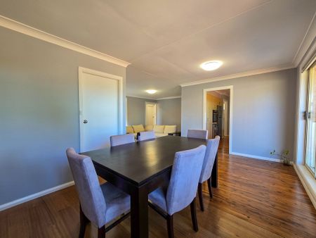 Spacious Family Home with Drive-Through Parking & Outdoor Entertaining - Photo 2