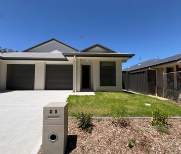 Modern 3-Bedroom Family Home with Ducted Air and Stylish Finishes - Photo 5