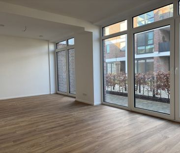 Erstebezug: Schöne Erdgeschosswohnung direkt am Norder Tief! - Photo 2