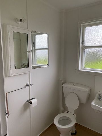 Tidy 2 Bedroom with large backyard - Photo 3