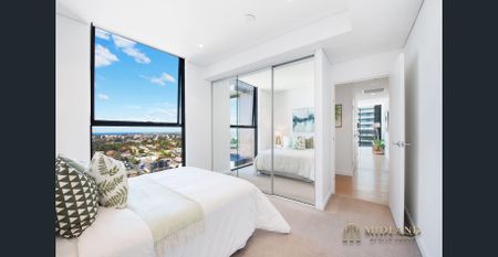 Stunning Two-Bedroom Penthouse with Breathtaking Water Views - Photo 2