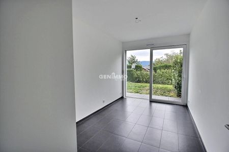 Rez-de-jardin contemporain avec 400 m² de jardin, proche du lac - Photo 2