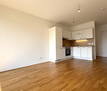 Kompakte + günstige Neubauwohnung mit MEGA-SÜD-LOGGIA (11,70m²) nah... - Photo 1