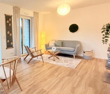 Wohlfühlen leicht gemacht - Neubauwohnung mit Garten - Photo 1