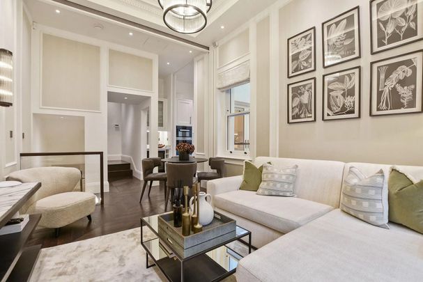 An newly refurbished two-bedroom apartment with two private balconies located just a few minutes walk from Kensington High Street. - Photo 1