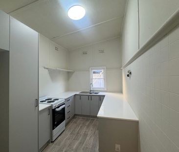 Newly Renovated Family Home with Excellent Living Appeal - Photo 5