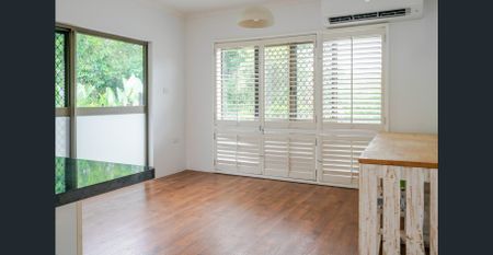 Charming 4-Bedroom Family Retreat with Pool & Solar in Mooroobool - Photo 3