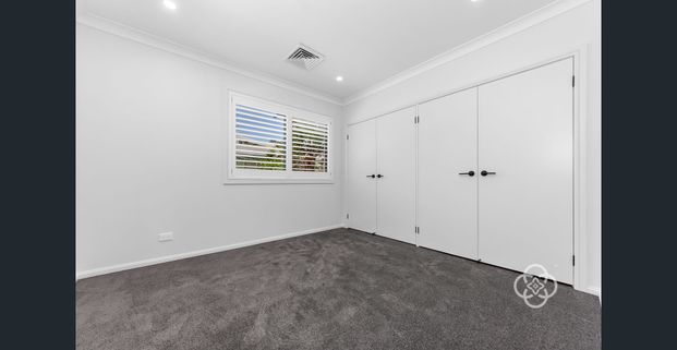 Coming Soon - Brand New Stylish 4-Bedroom Duplex with Lake Views - Photo 1