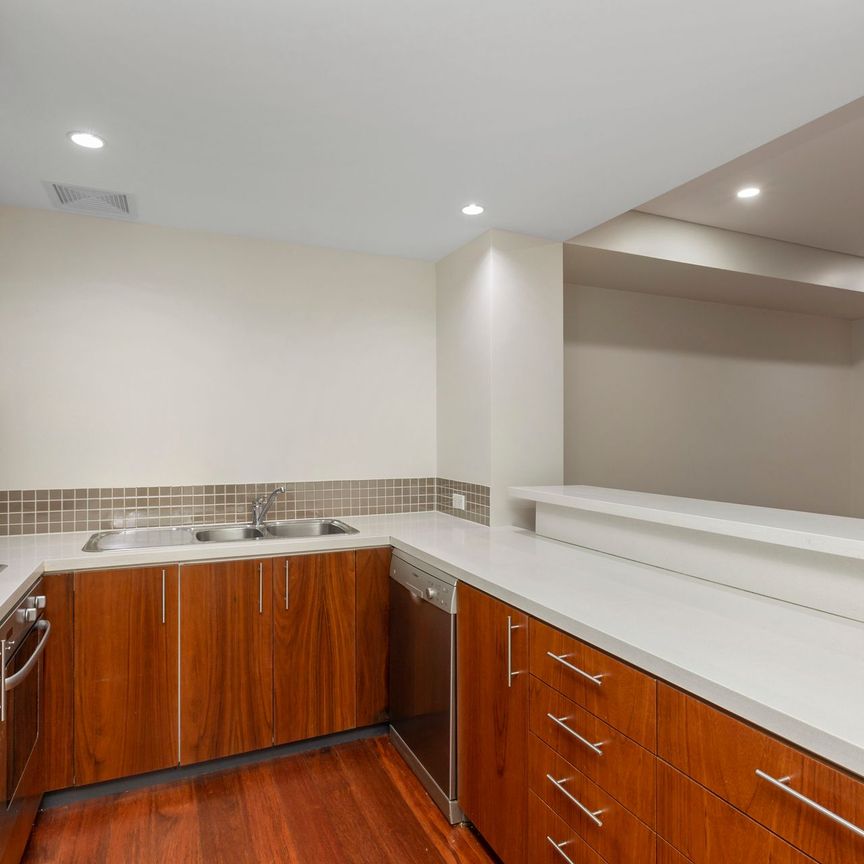 Spacious Four-Level Townhouse Offering Comfort, Style & Convenience - Photo 1