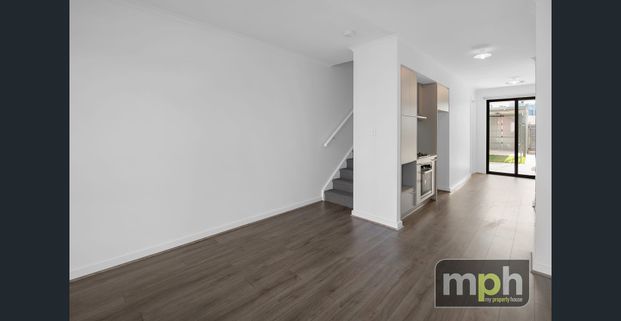 Modern Living in a Near New Townhouse - Photo 1