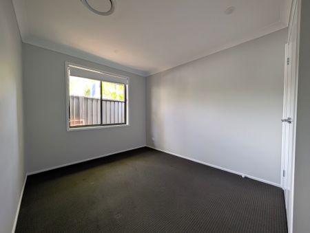 Modern 4-Bedroom Home in a Convenient Gorokan Location - Photo 3