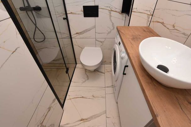 Znakomita nowoczesna kawalerka z nowymi AGD - Zdjęcie 1