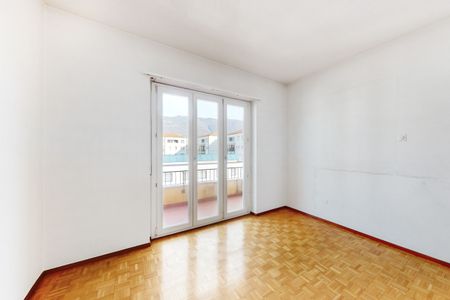 Appartamento 3.5 locali luminoso e funzionale in zona strategica - Photo 3