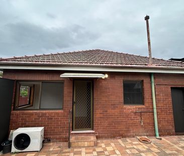 Freshly renovated house In Walk-to Everything Location perfect from... - Photo 5