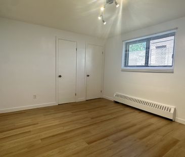 Sérénité moderne, appartement rénové, demi-sous-sol à Saint-Léonard - Photo 6