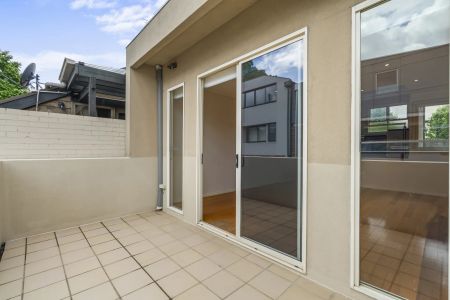 Live the Richmond Dream- Modern Comfort, a Sun-Filled Balcony, and the Best of Melbourne Right at Your Doorstep! - Photo 4