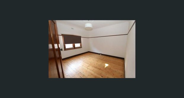 Charming 3-Bedroom Home with Classic Appeal in Prime Location - Photo 1