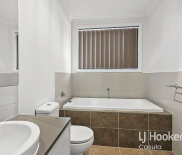 Modern 4-Bedroom Family Home - Photo 6