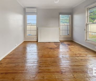 SPACIOUS FAMILY HOME WITH PLENTY OF BACKYARD SPACE - Photo 1