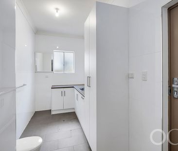 Open the Door to Style, Security, and Location in Woodville South - Photo 6