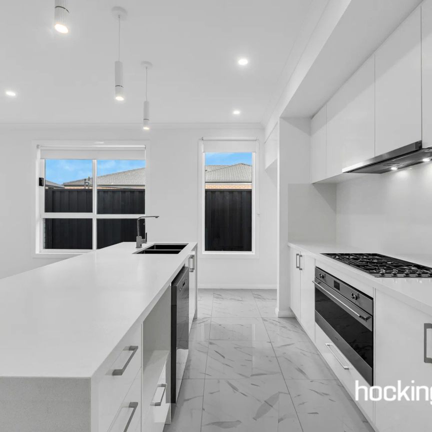 BRAND NEW LIGHT FILLED FAMILY HOME IN BEVERIDGE - Photo 1