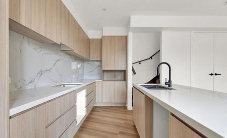 Modern Two-Bedroom Townhouse in Prime Reservoir Location - Photo 2