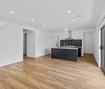 Brand New Family Home with Modern Comforts & Secure Living - Photo 4