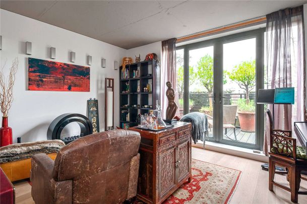 A truly stunning duplex penthouse apartment with off street parking, arranged over the fifth and sixth floors of this boutique modern development. - Photo 1