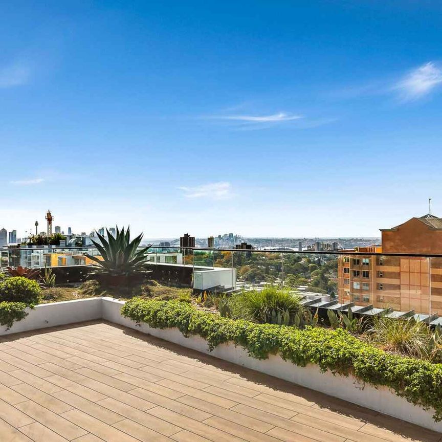 BEAUTIFULLY APPOINTED NORTH FACING APARTMENT WITH PARKING - Photo 1