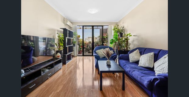 Modern Three-Bedroom Apartment in the Heart of Toongabbie - Photo 1