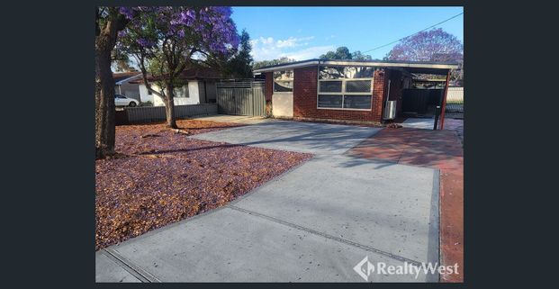 Fresh, Low-Maintenance Living in a Super Convenient Location - Photo 1