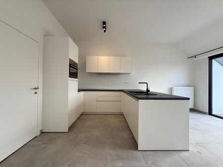 Twee-slaapkamerappartement op een centrale ligging in Ooigem. - Photo 4