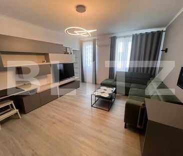 Apartament cu 3 camere, semicentral, parcare subterana, in zona Paris - Photo 2
