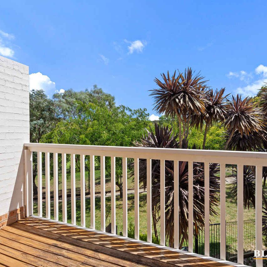 Stylish 3-Bedroom Townhouse with Golf Course Views & EV Charging - Photo 1