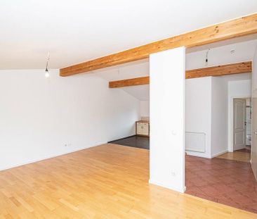 Vermietung: Helle Dachgeschosswohnung mit Balkon und Wohlfühlambiente - Foto 3