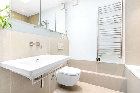 A stunning extended and meticulously refurbished house on arguably one of West Putney's prettiest streets. - Photo 3