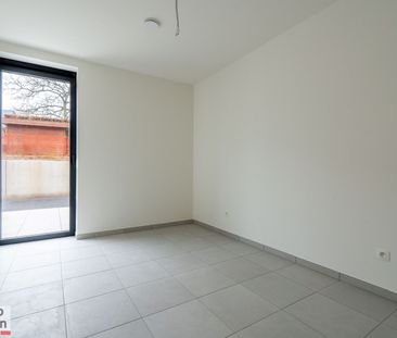 Gelijkvloers nieuwbouwappartement met 2 slaapkamers, terras en tuintje - Photo 3