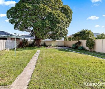 Stylish 4 Bedroom Home with Large Sunny Backyard - Photo 3