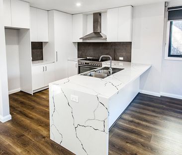 Low maintenance, modern living - Photo 5