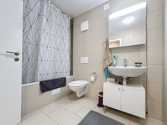 Bel appartement de 3,5 pièces au rez-de-chaussée avec terrasse - Foto 1