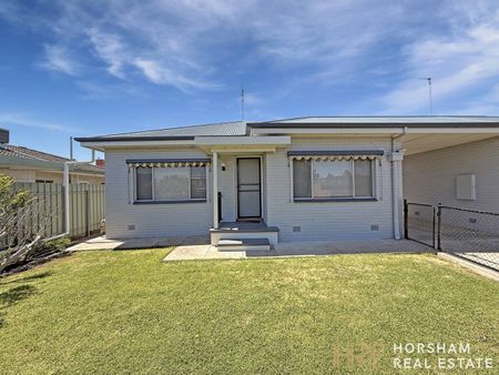 Modern Three-Bedroom Home Close to the CBD - Photo 4