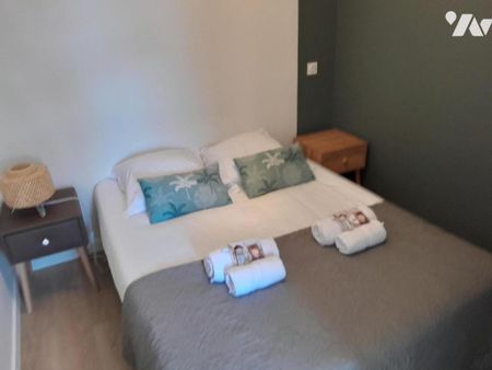 A LOUER APPARTEMENT MEUBLE T2 LAVAL - Photo 4