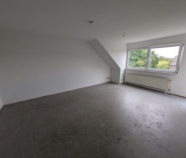 schöne Dachgeschoss-Wohnung in Scholven - Foto 1