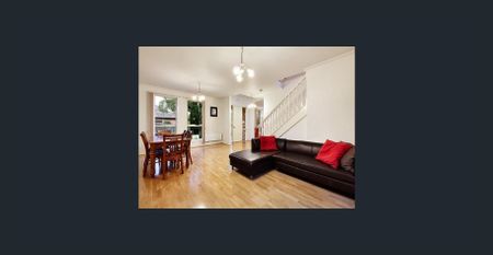 Well-Maintained Townhouse with Fresh Updates in Prime Location - Photo 2