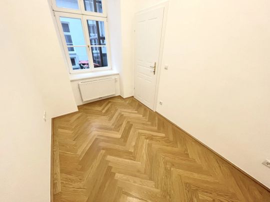 Stilvoll sanierte Altbauwohnung in bester Innenstadtlage – Ruheoase am Getreidemarkt - Foto 1