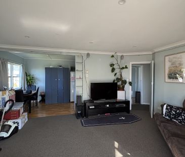 Sunny Family Home with Large Fully Fenced Section - Photo 6