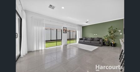 Low-Maintenance Family Living with Theatre, Study & Triple Garage - Photo 5